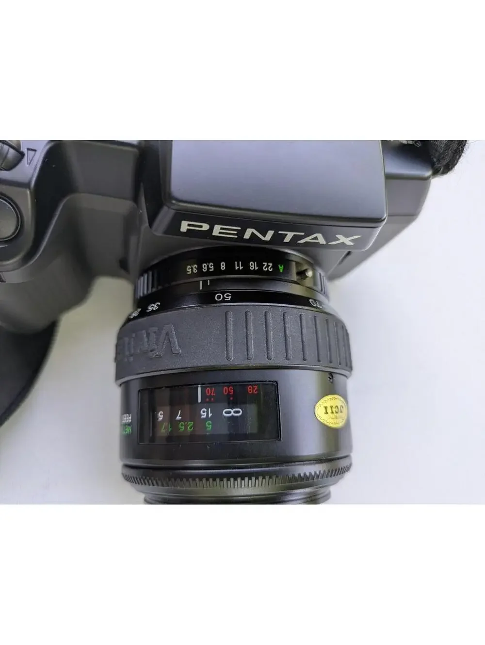 Pentax SF10 35mm camera, vivitar 28-70mm, 1:3.5-4.5 autofocus zoom, japan, as is